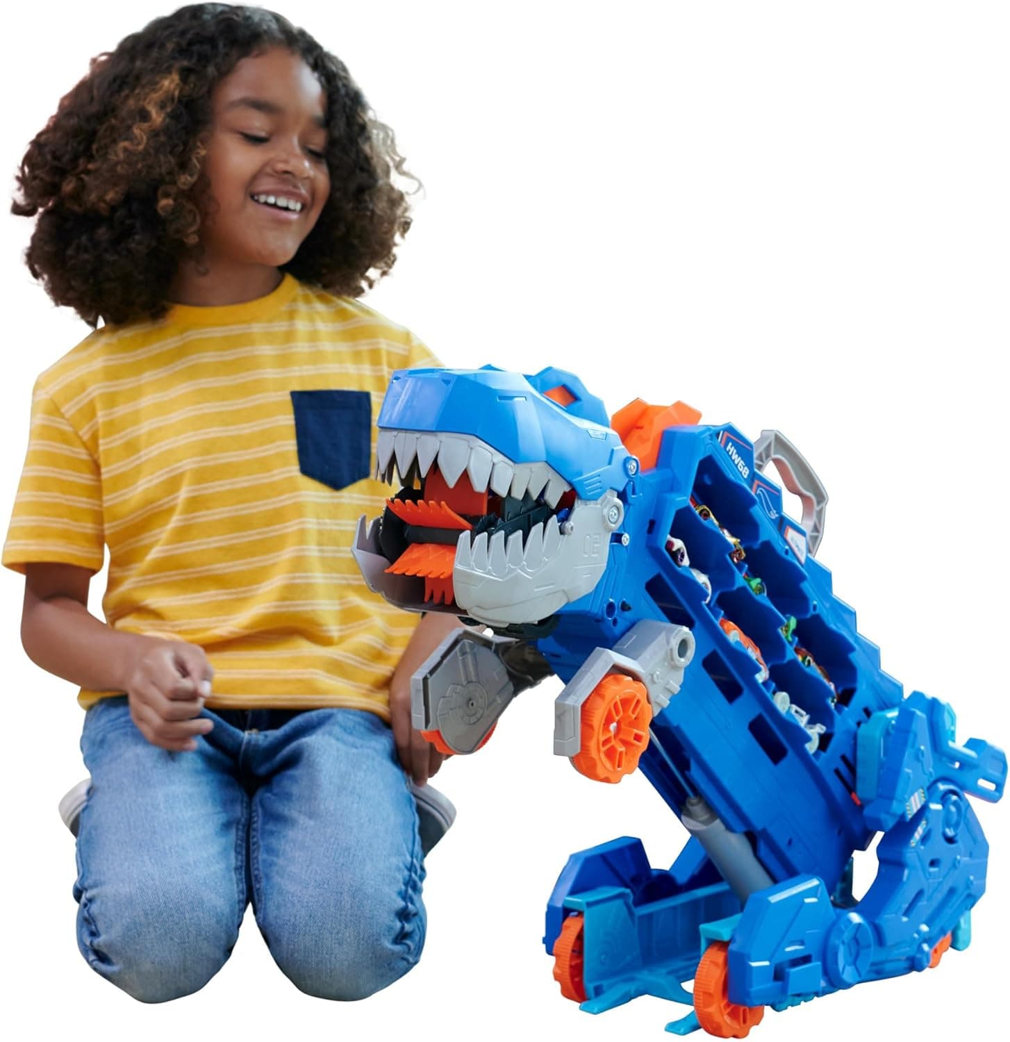 Hot Wheels City “Let's Race - ¡a Correr!” Netflix - Camión T-Rex definitivo Dinosaurio Transporte y Pista para Coches de Juguete, Incluye 2 vehículos, +4 años (Mattel HNG50)