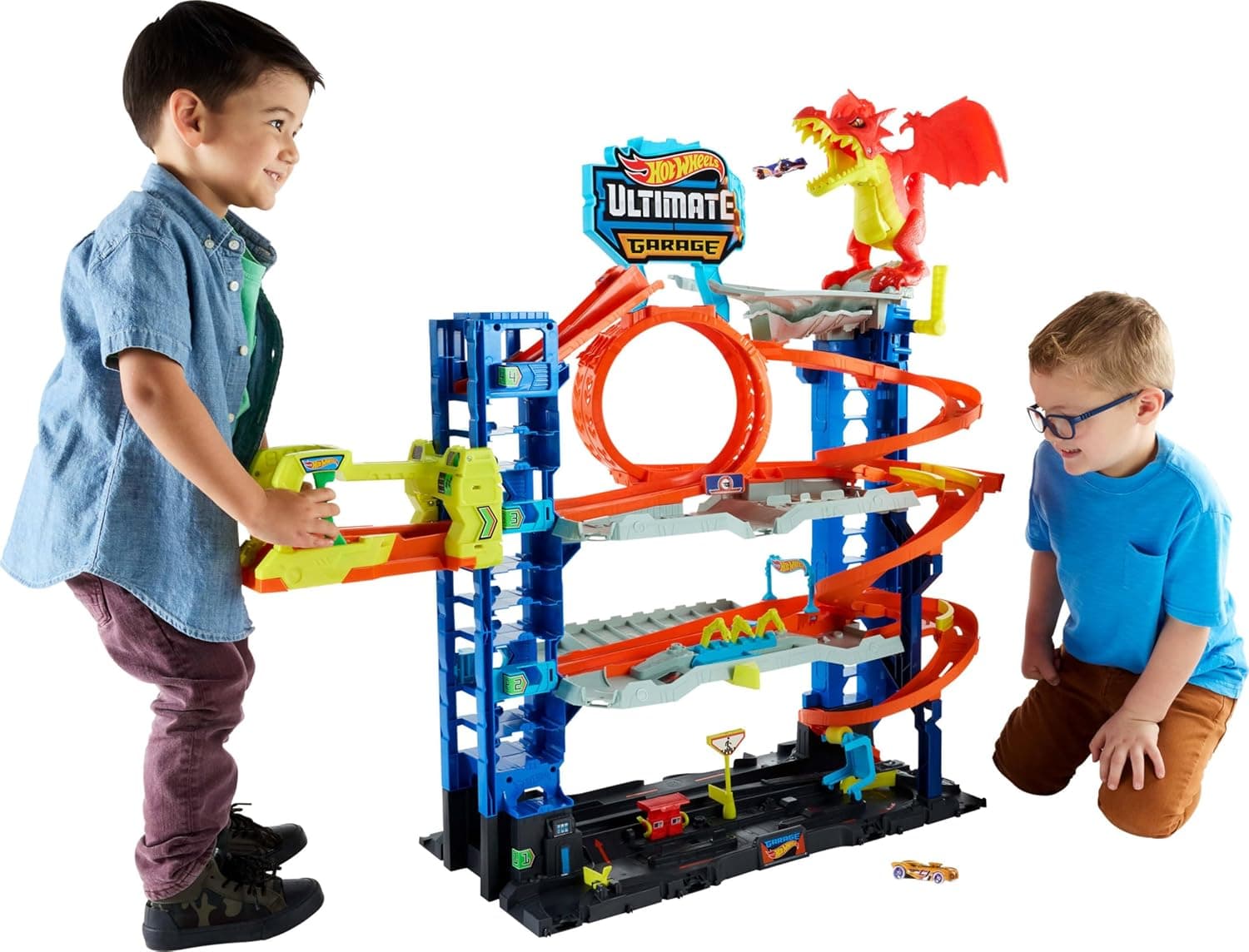 Hot Wheels City “Let's Race - ¡a Correr!” Netflix - Garaje definitivo Pista para Coches de Juguete con dragón y 4 Niveles, Incluye 2 vehículos, +4 años (Mattel HKX48)